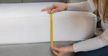 Steghöhe messen: So findest du das passende Spannbettlaken für dein Bett